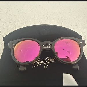 Maui Jim sunglasses. Had them for a month just not my style! Paid $300